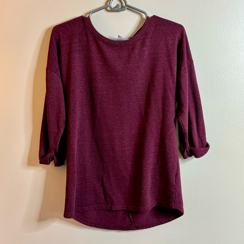 Divided Maroon sweater with three-quarter cuffed sleeves